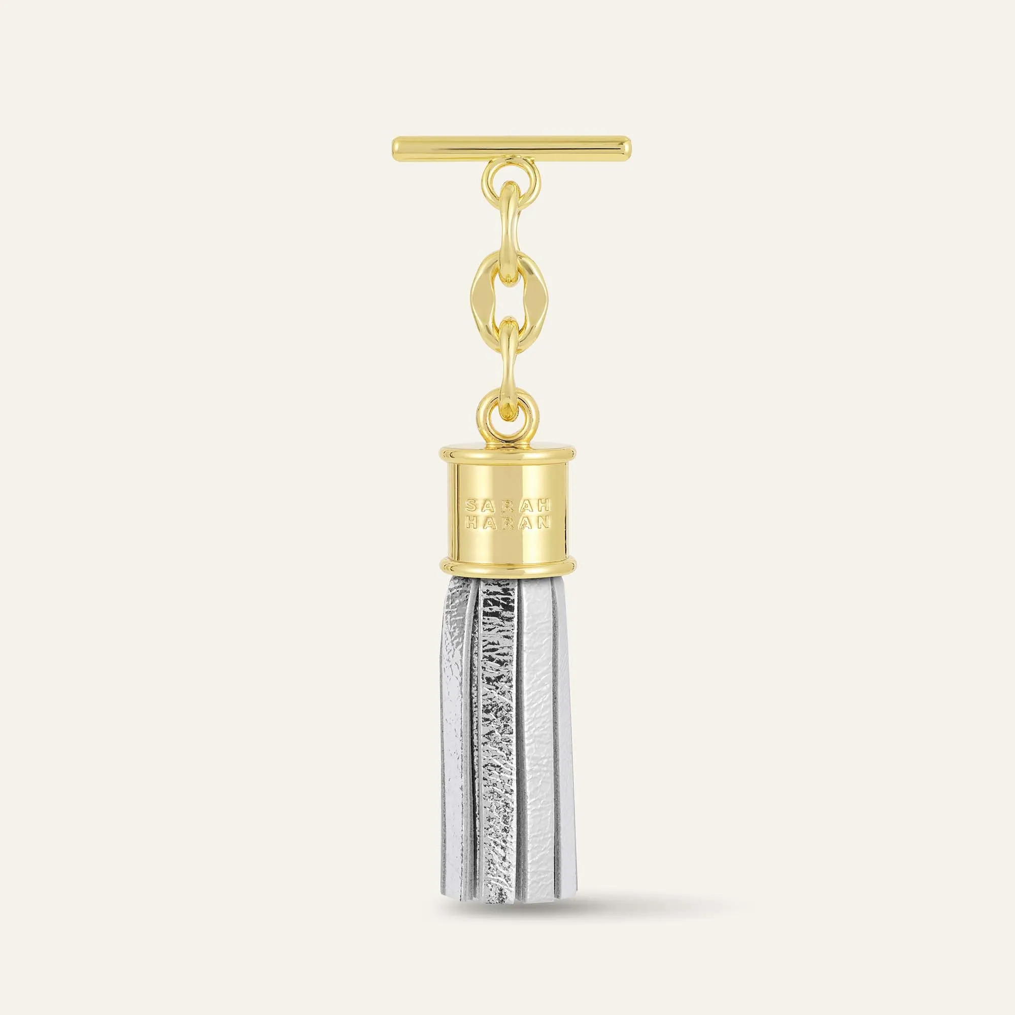 Capsule Tassel Mini | Metallic Silver with Gold hardware
